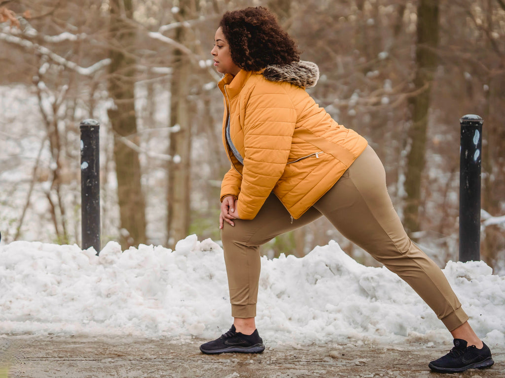 Calf Stretch Woman Stretching in Snow Lastics Blog